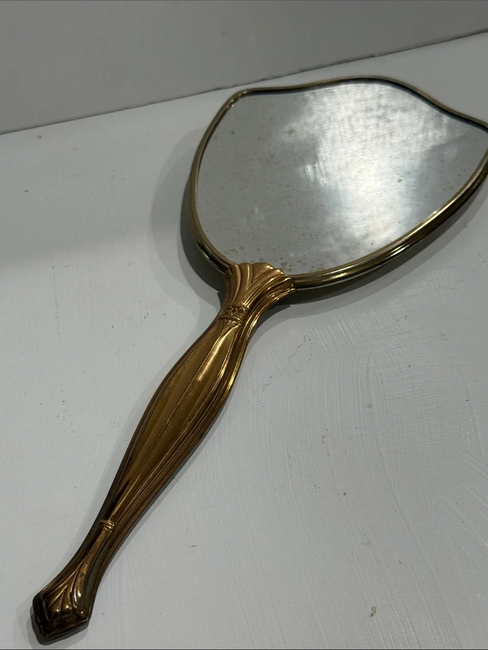 Mid Century Hollywood Regency Hand Held Mirror with Floral Detail 1950’s